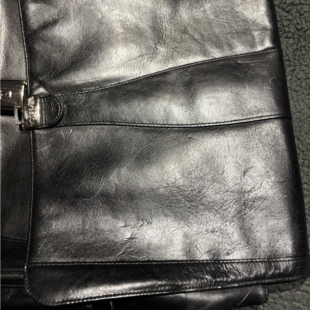 Elegant Black Leather Briefcase with Distinctive Patina